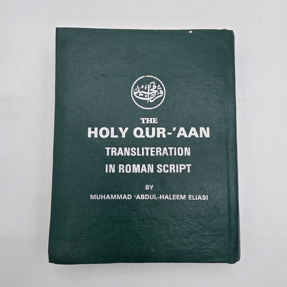 The Holy Qur'an: Transliteration in Roman Script and English Translation HC Book